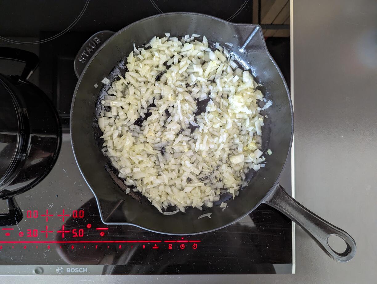Chopped onion and garlic in a pan