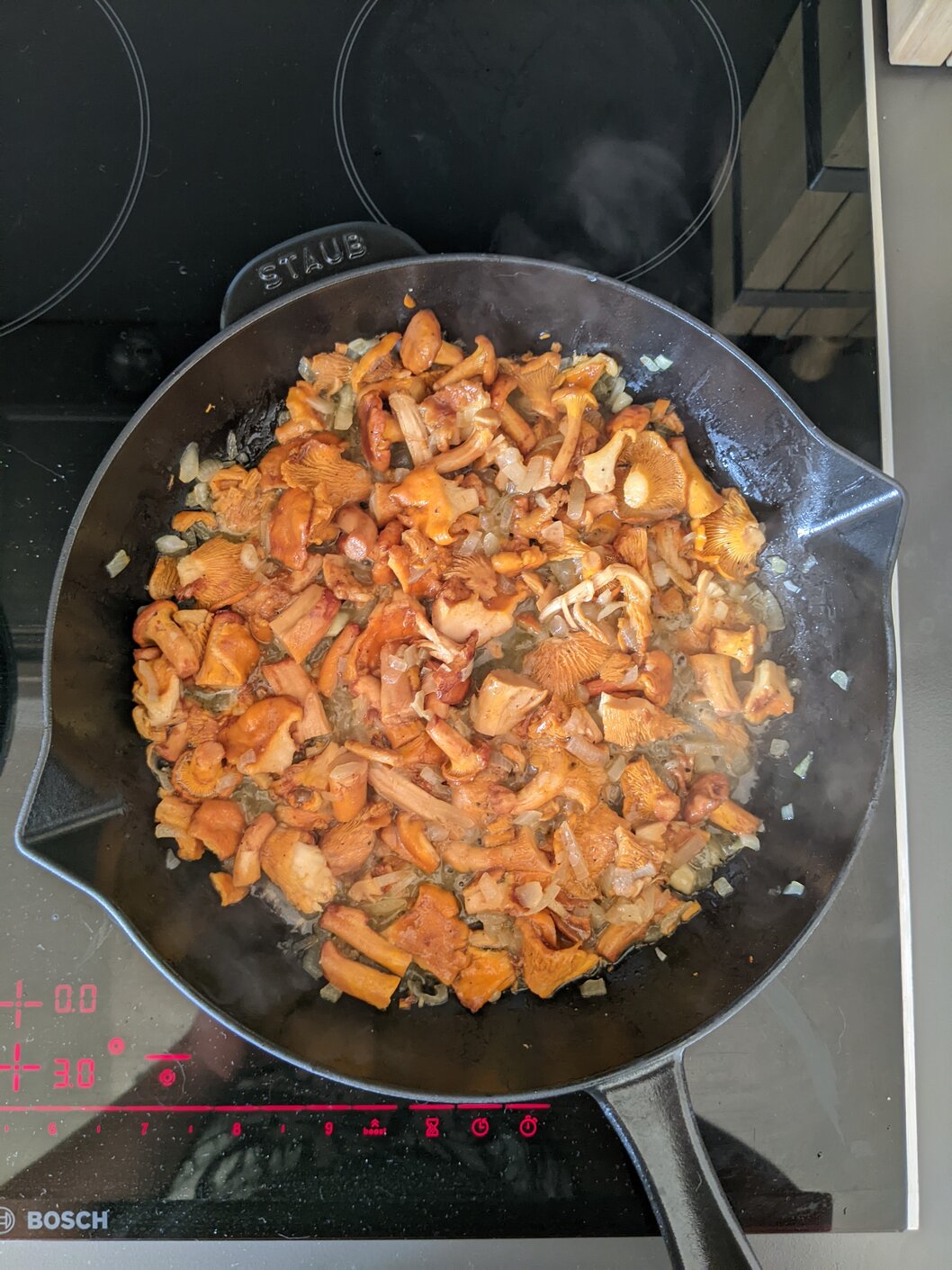 Onion and mushrooms in a skillet