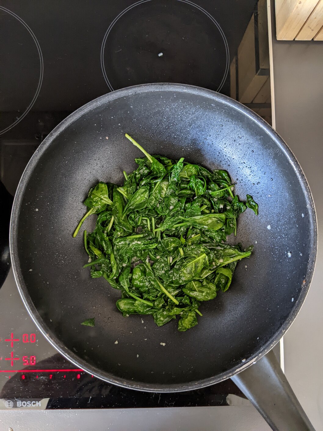 Cooked spinach in a pan